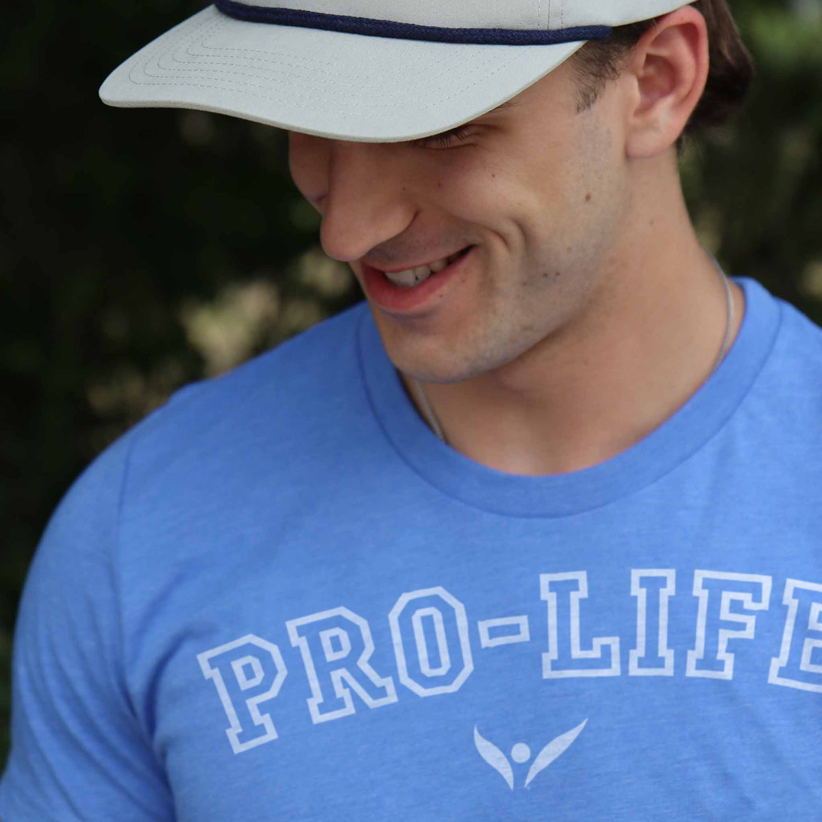 Man wearing a blue 40 Days for Life 'PRO-LIFE' t-shirt with a gray rope cap.