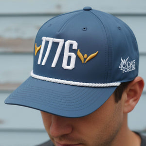 Blue cap with '1776' and '40 Days For Life' logos worn by a person.