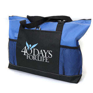 Blue tote bag with black top section featuring '40 Days for Life' logo on a white background